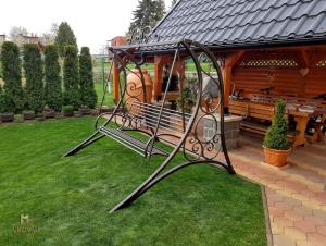 A garden swing - a hand-forged rocking bench - (NBK-72)